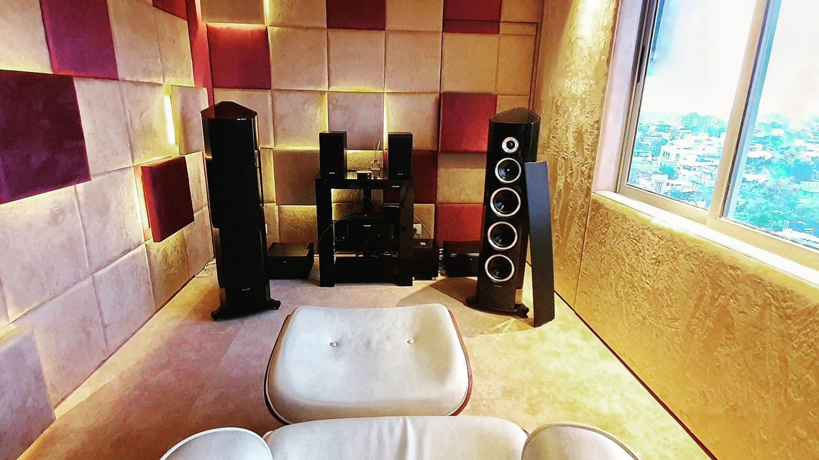 Floorstanding speaker setup by the window at the demo flat